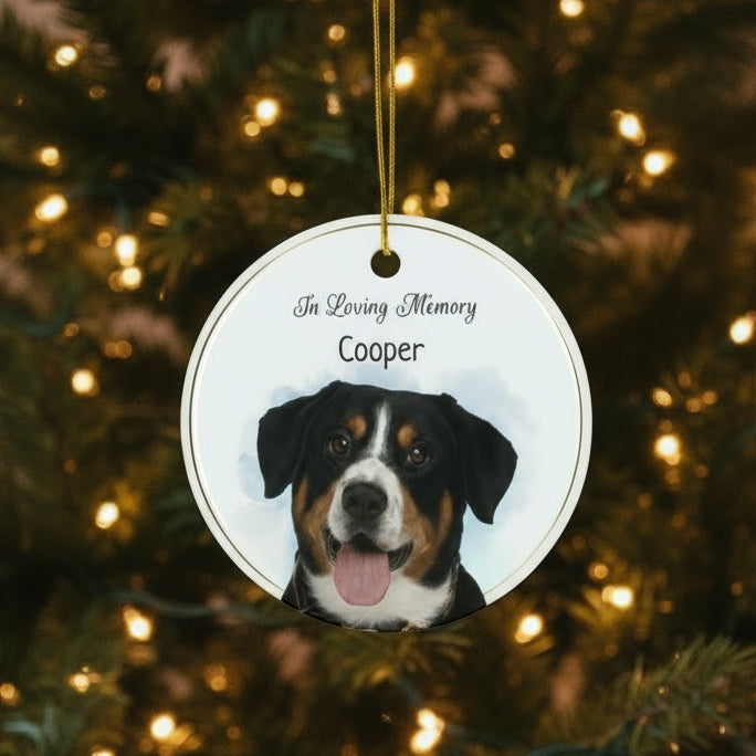 Round ceramic ornament with a dog's face and 'In Loving Memory Cooper' text on a white background