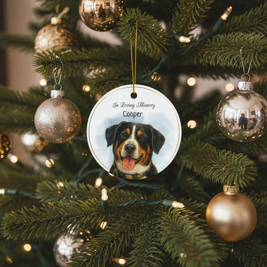 Round ceramic ornament with a dog's face and 'In Loving Memory Cooper' text on a white background
